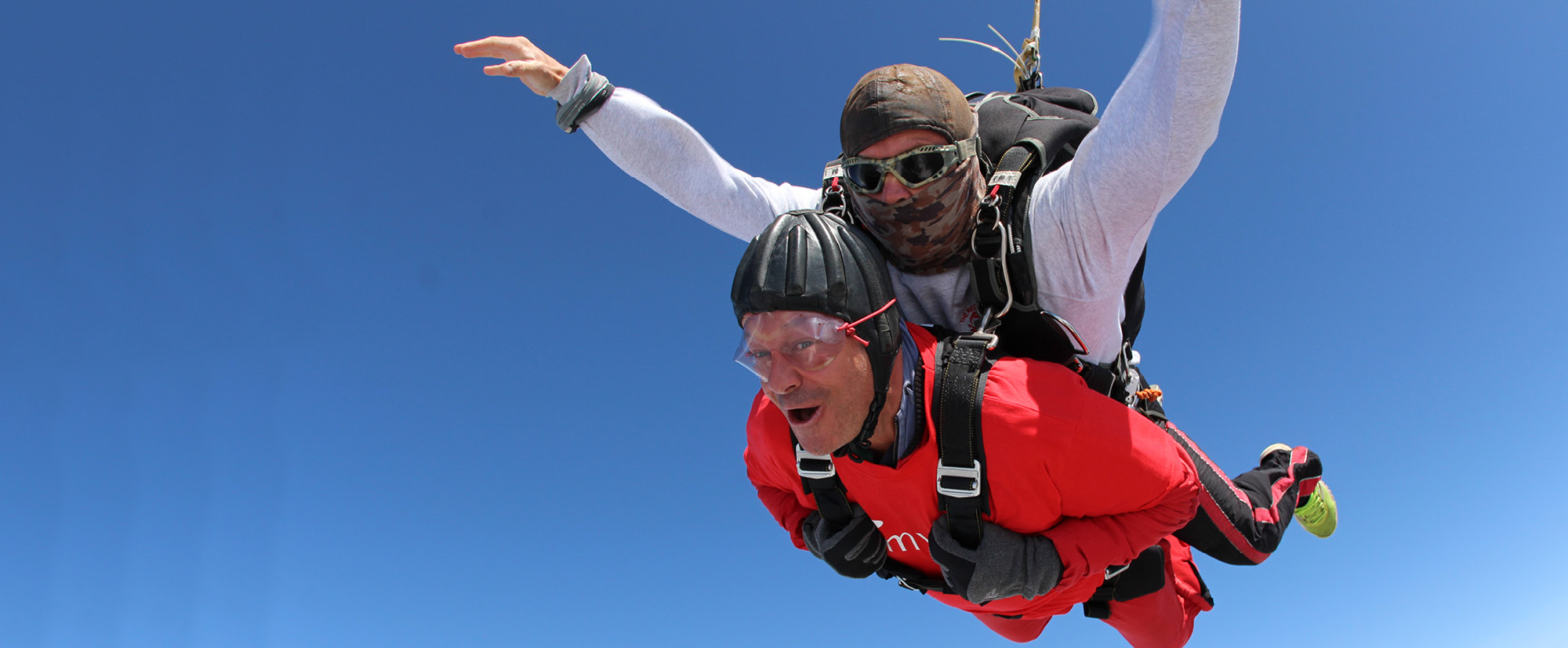 A participant taking part in a tandem skydive for The Myton Hospices