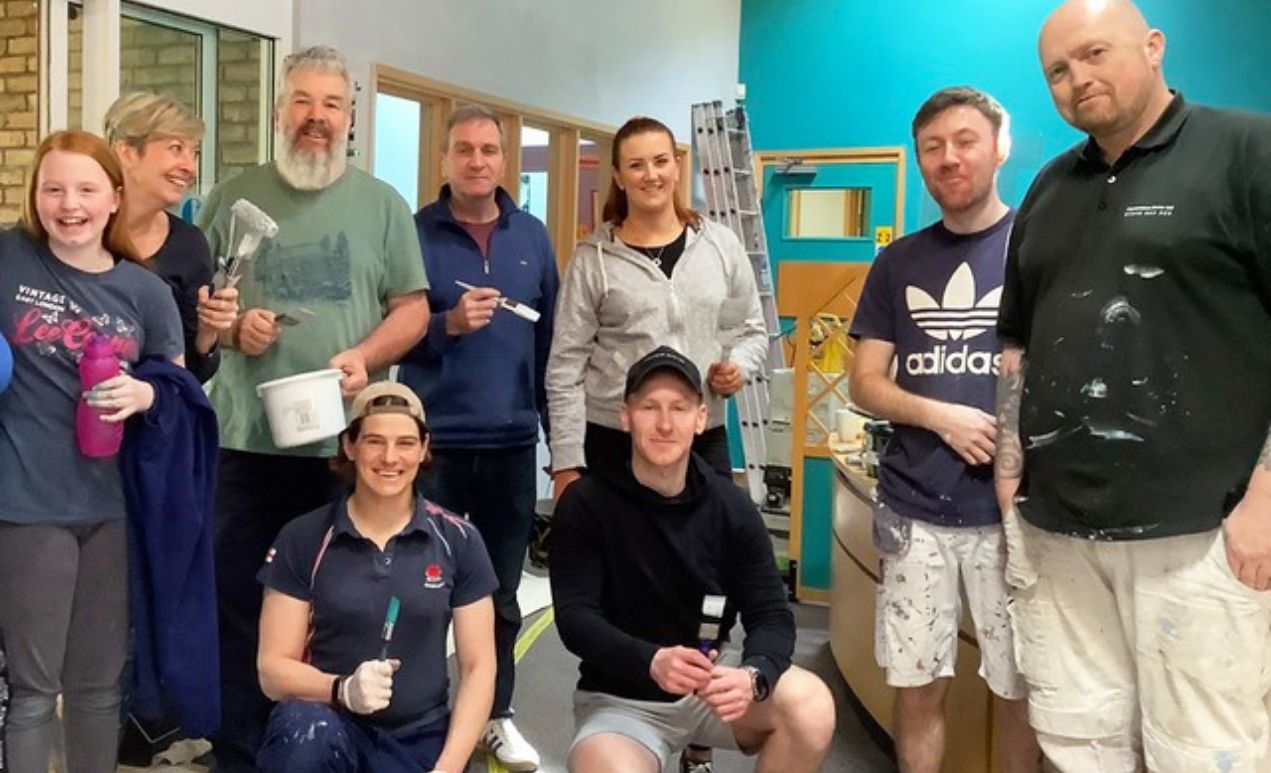 Grace and other volunteers redecorating Rugby Myton Hospice