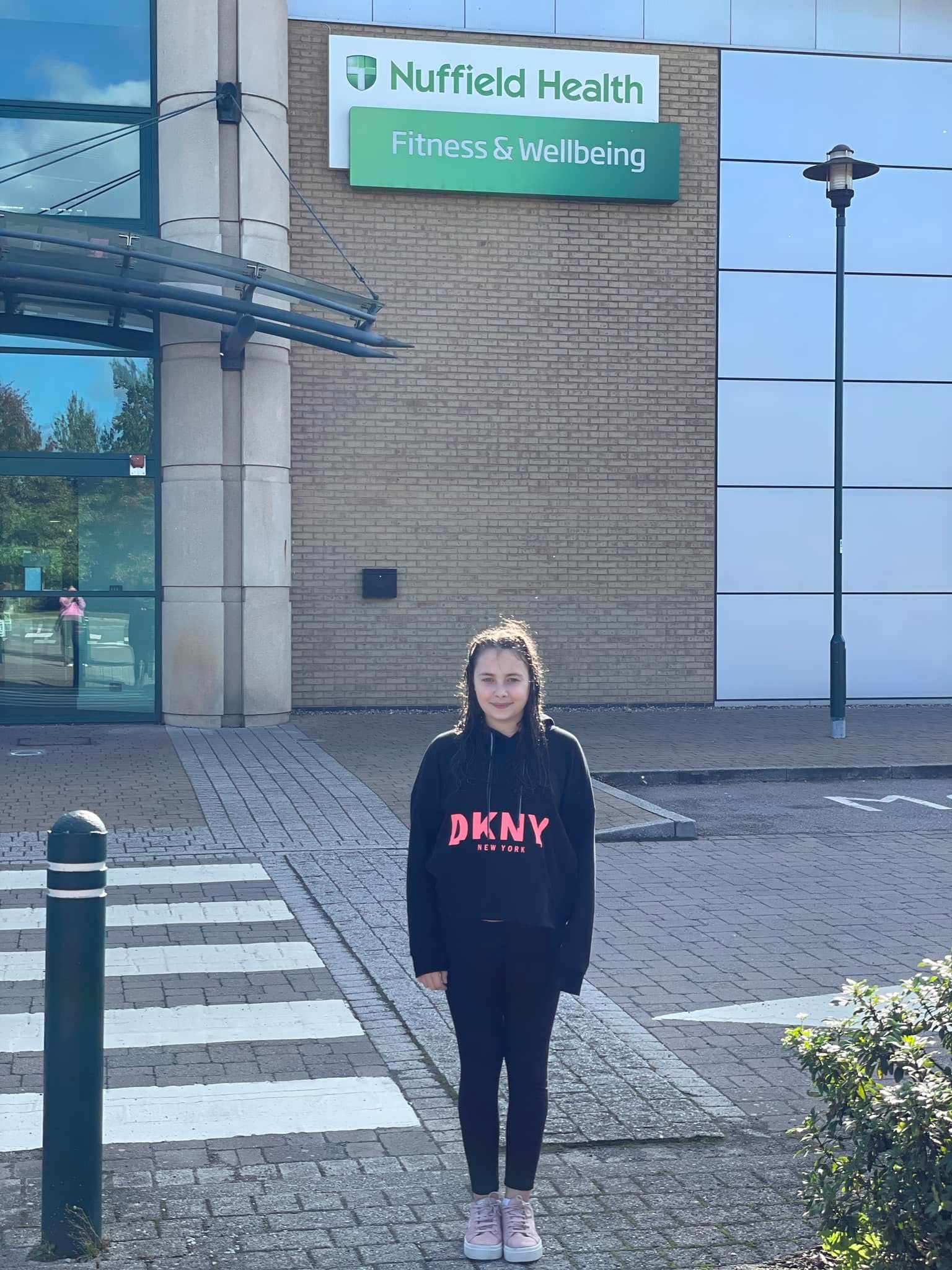 Evelyn outside swimming pool