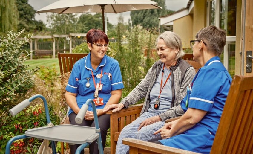 Patient with nurses outside