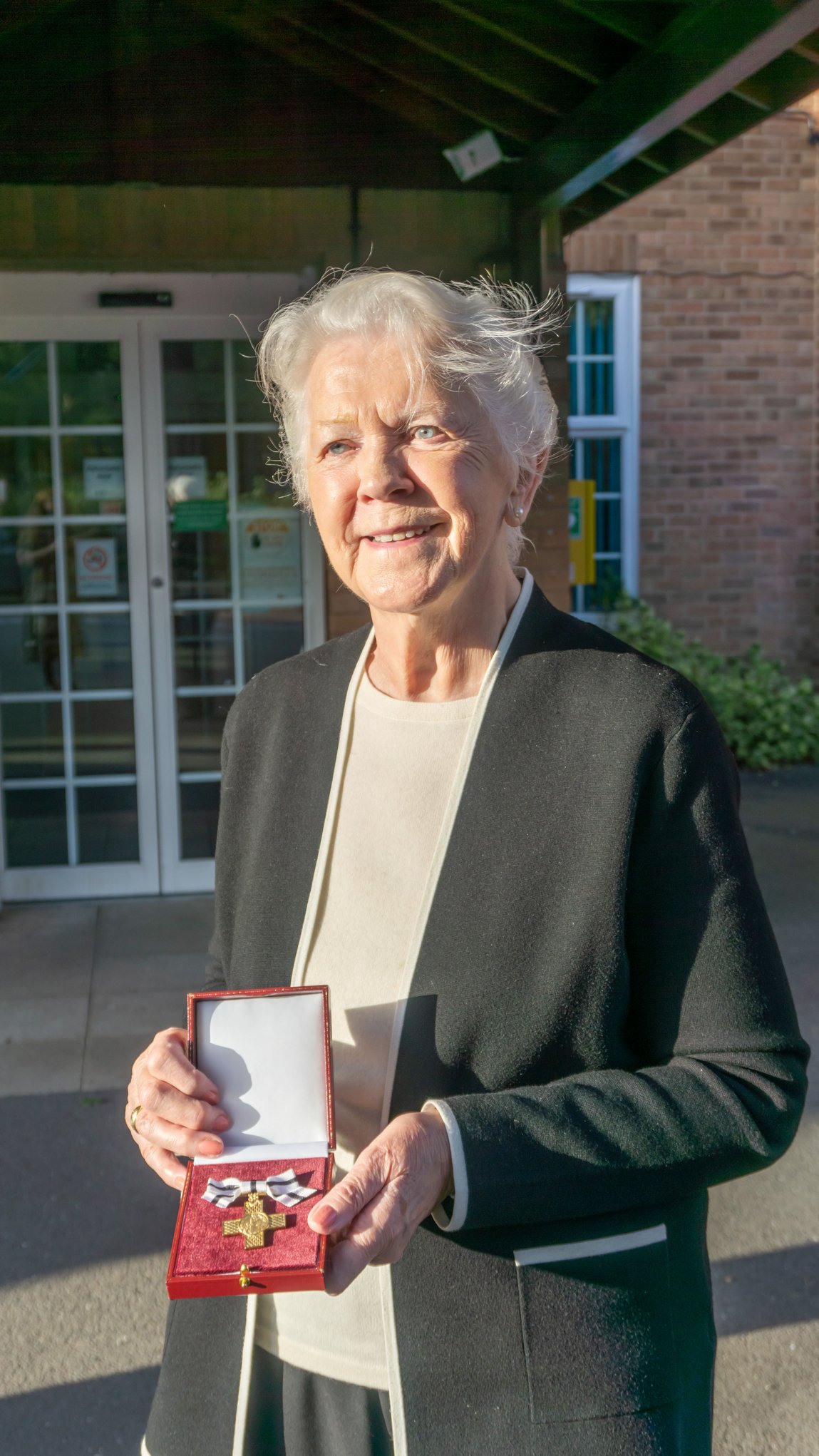 Volunteer Gillian Clark with award