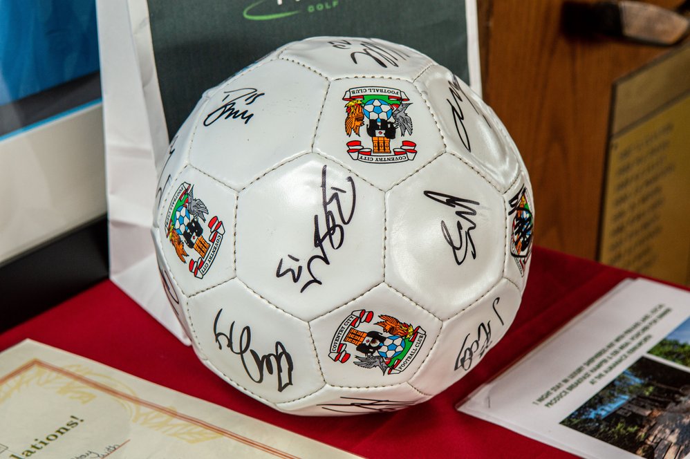 GolfDay22-0427 golf day football prize