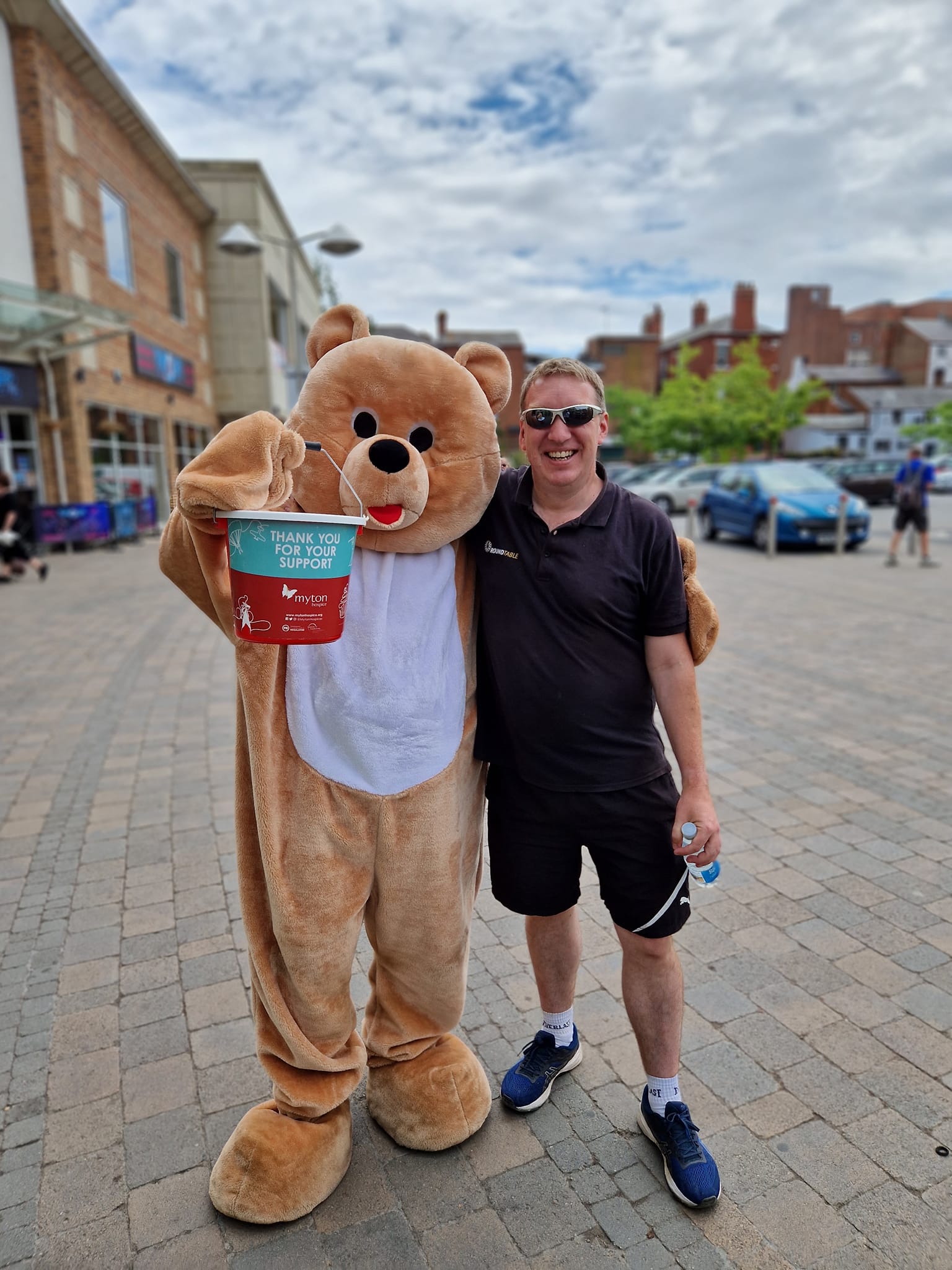 The Myton Hospices - Monty the Bear with volunteers from Rugby Round Table