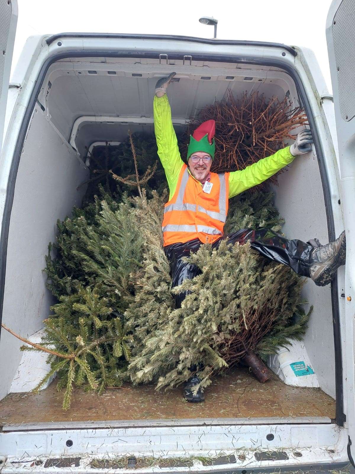 The Myton Hospices - Christmas Tree Collection Van and Volunteer