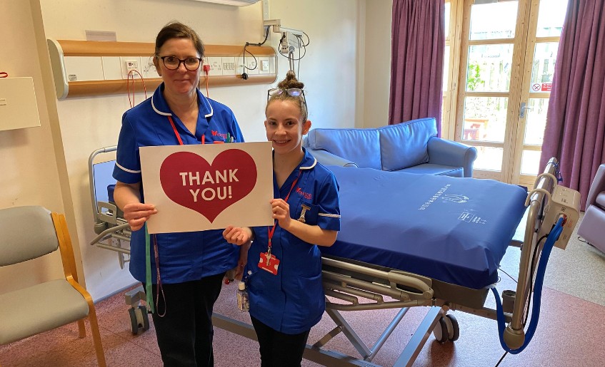 The Myton Hospices - Nurses with the cuddle bed