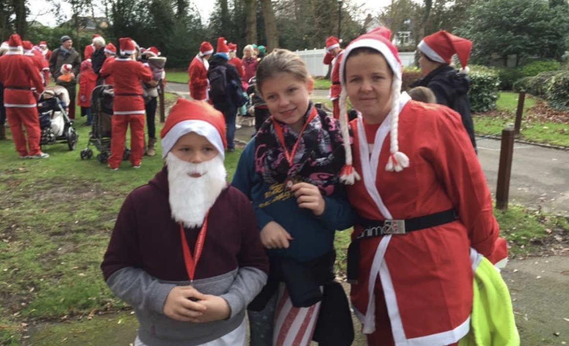 The Myton Hospices - Joanne and family at the Santa Dash The Myton Hospices - Joanne and family at the Santa Dash