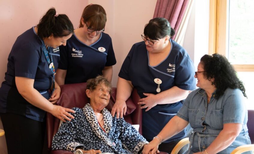 The Myton Hospices - Blog Header - Patient with Nurses
