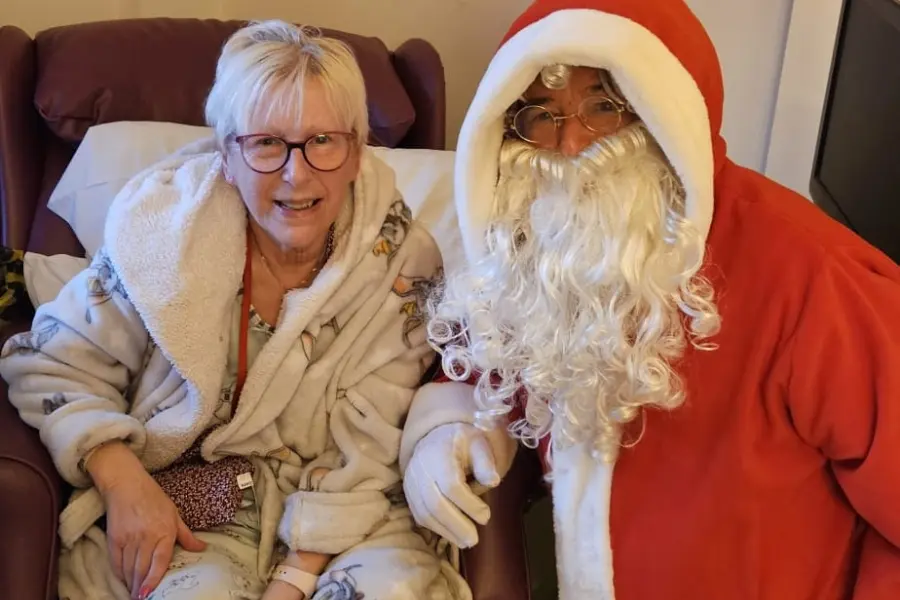 The Myton Hospices - A Patient and Father Christmas at Coventry Myton Hospice